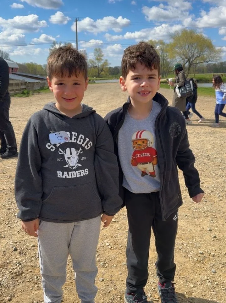 Two young students on a school outing
