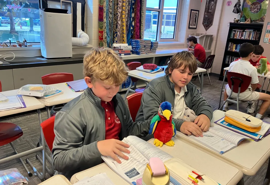 Students working at their desks in class