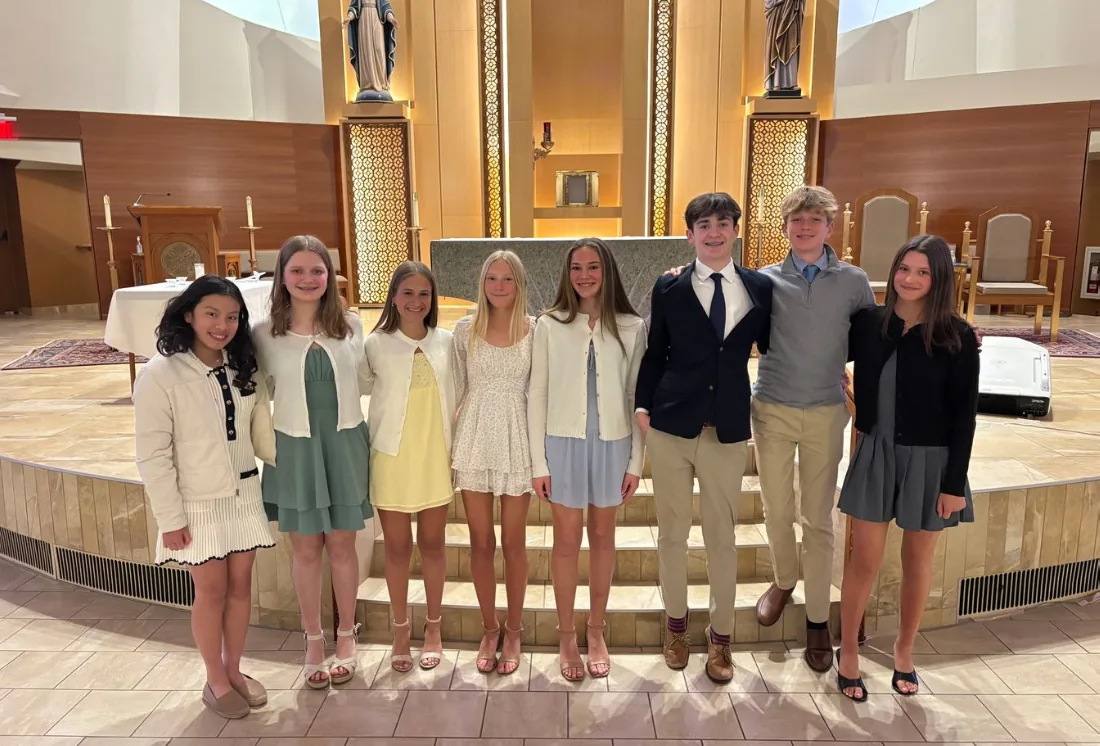Students dressed up at the front of the church