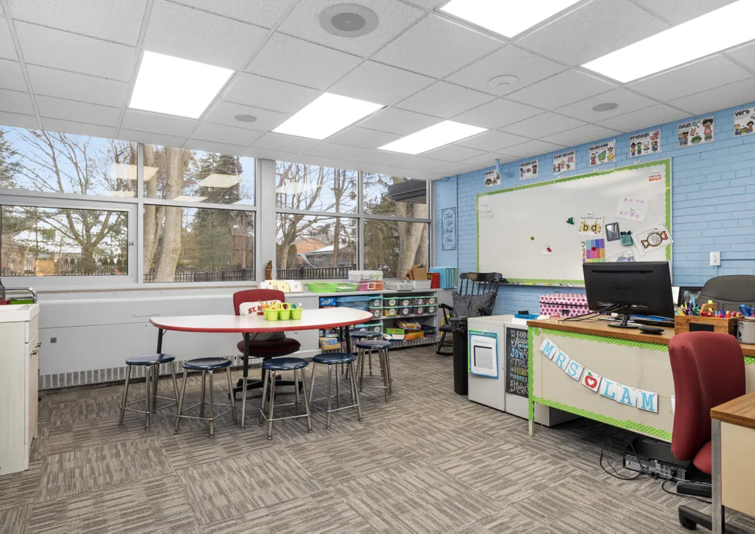 St. Regis classroom with teacher's desk