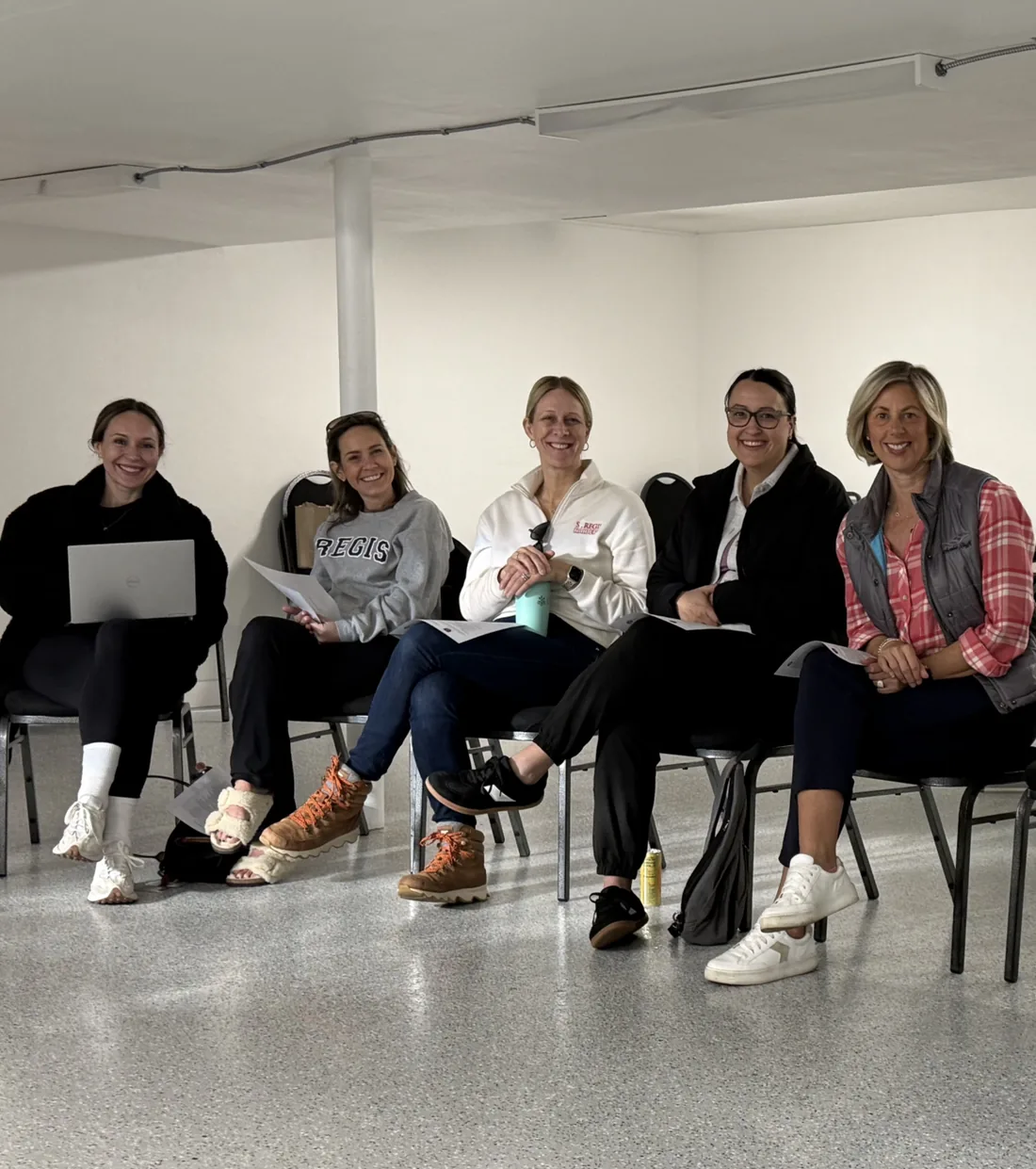 St. Regis Parent Association moms at a meeting