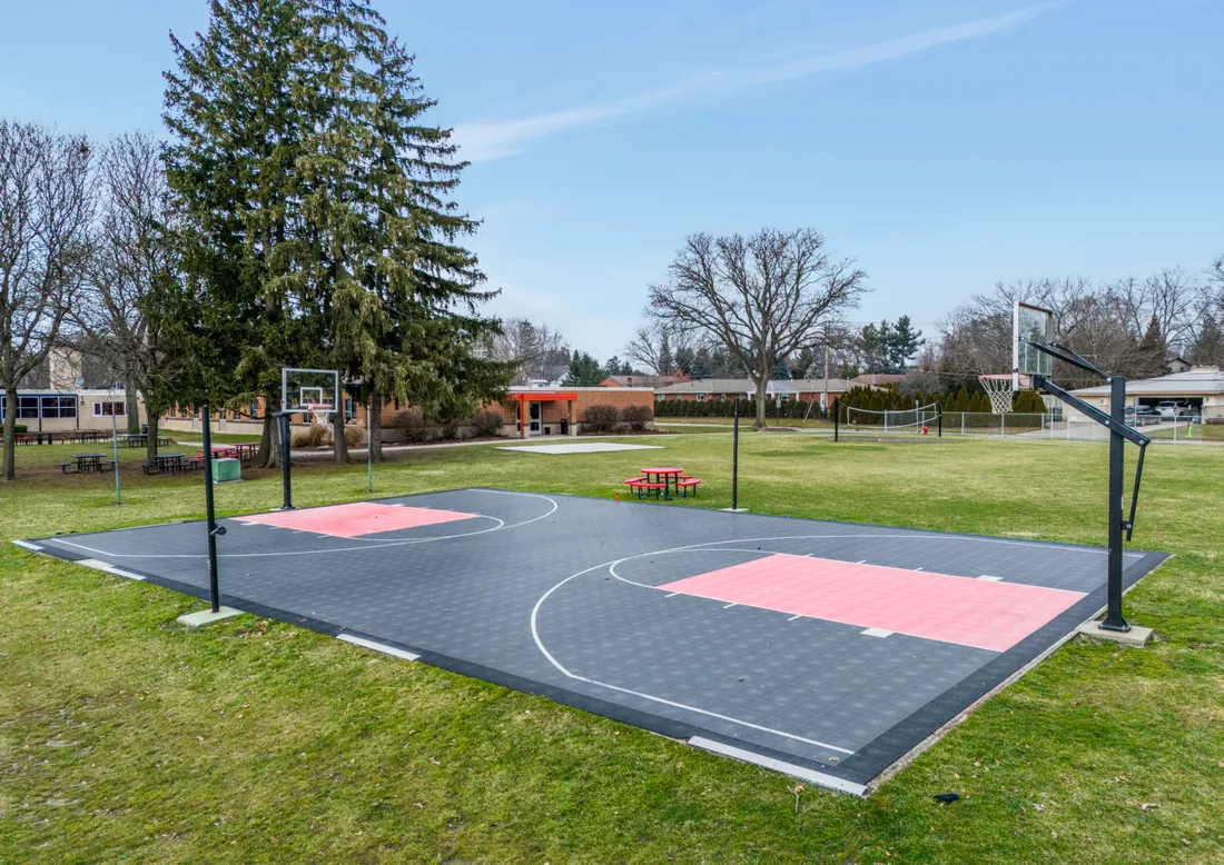 Outdoor basketball court on the St. Regis campus