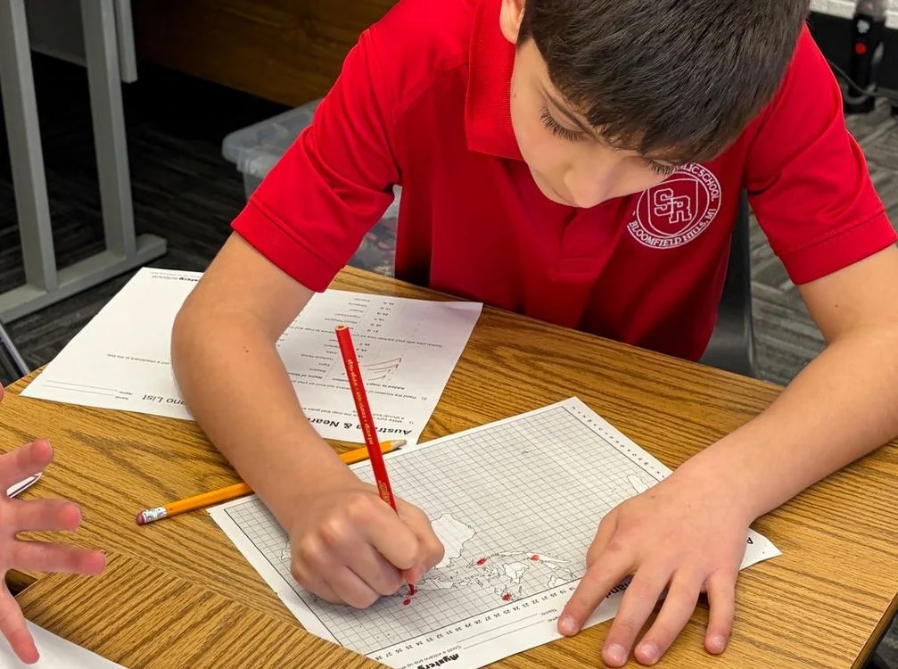 Student working on a written assignment