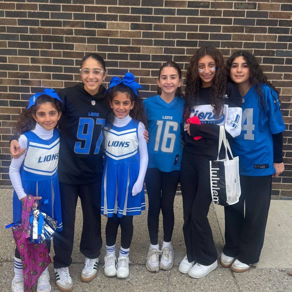 Students in Detroit Lions gear at a school spirit event