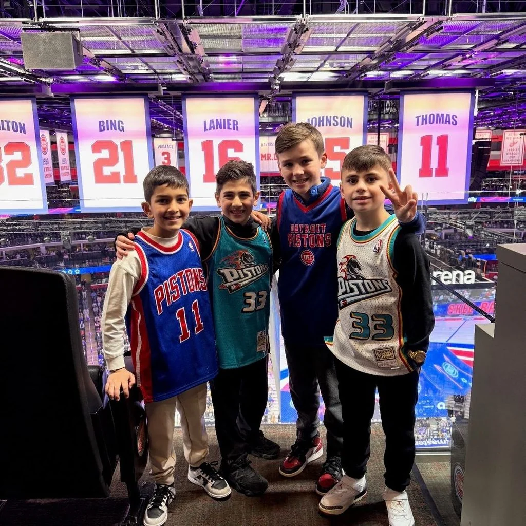 Students on a field trip to a Detroit Pistons arena