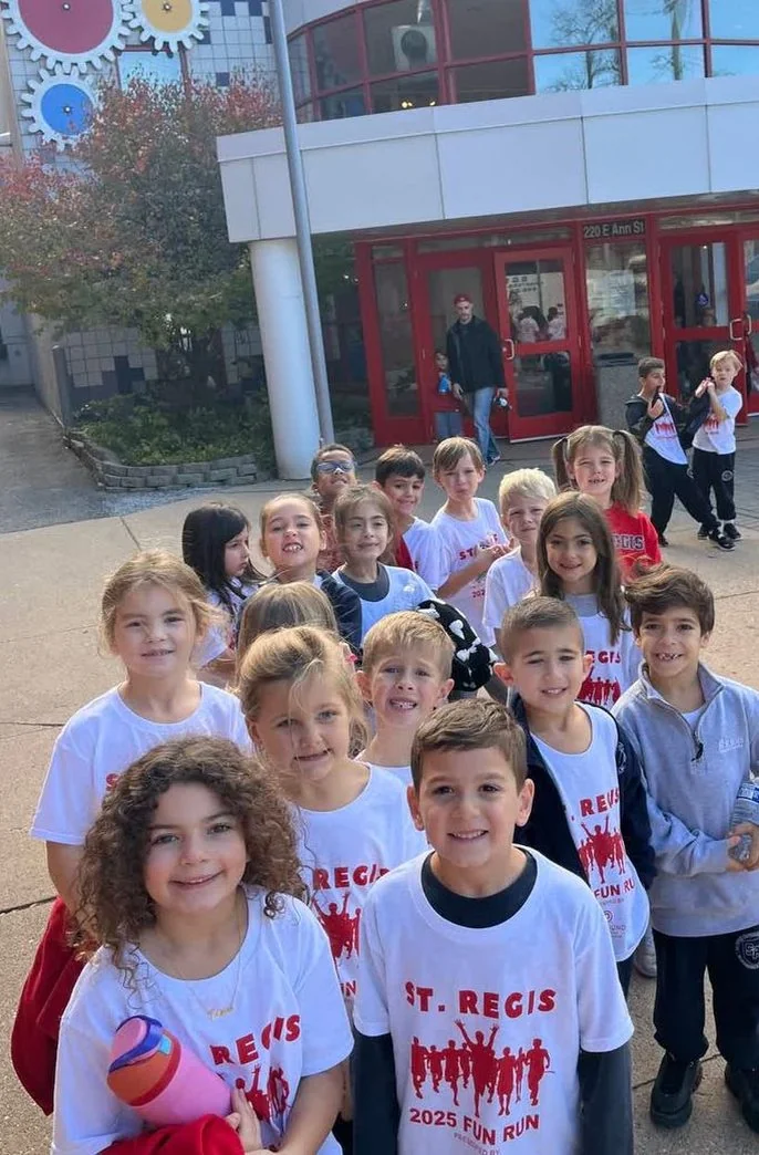Young students in St. Regis Fun Run T-shirts